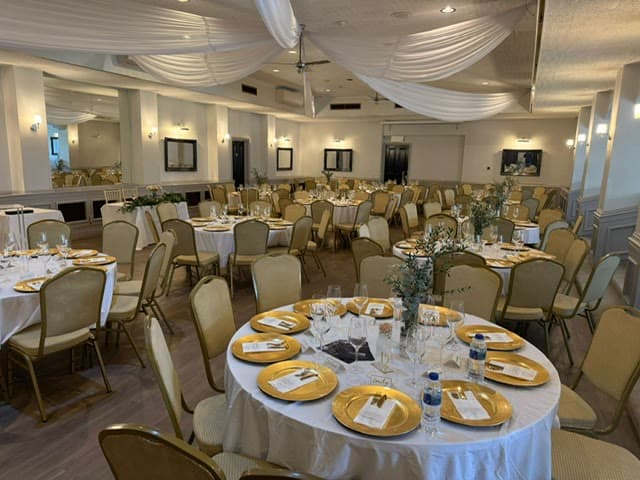 The Banqueting Suite at Chigwell Hall dressed for a wedding reception