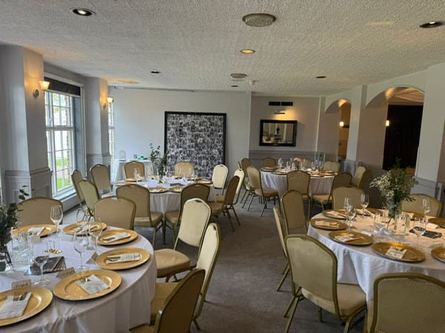 The Banqueting Suite at Chigwell Hall dressed for a wedding reception