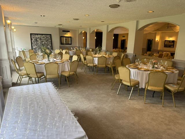 The Banqueting Suite at Chigwell Hall dressed for a wedding reception