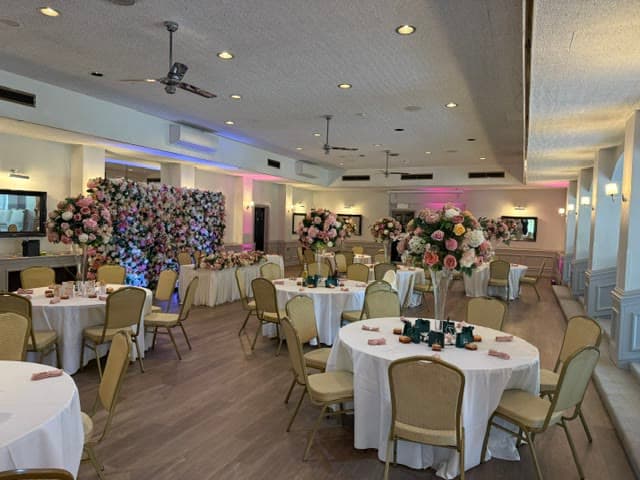 The Banqueting Suite at Chigwell Hall dressed for a wedding reception