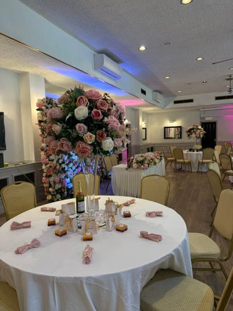 The Banqueting Suite at Chigwell Hall dressed for a wedding reception